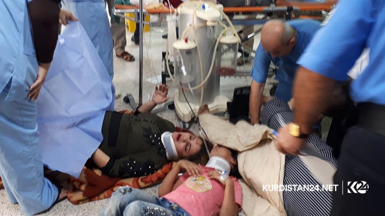 A mini bus carrying two Iraqi tourist families drove off a mountainous road in the Kurdistan Region, killing and injured tens of people  Aug. 30, 2019. (Photo: Kurdistan 24/Karwan Yara)